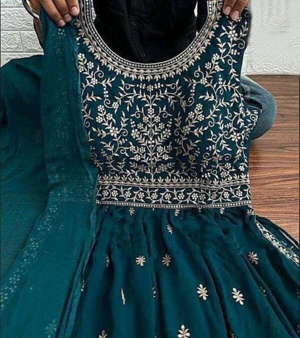 Naira Cut Peturn Gown With Embriodry Work - Image 5